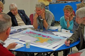 Rye residents meet to discuss preliminary sea-level rise scenario maps and identify community vulnerabilities. Photo by Rebecca Zeiber.