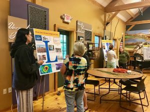 Teachers work on their climate poster presentations
