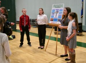 Students present climate posters, Climate in the Classroom - Sunapee 6th grade, 2020
