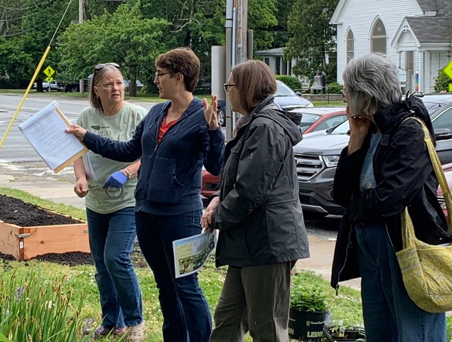 Climate Champion Rayann Dionne addresses a group