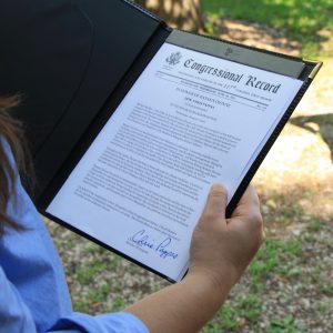 Senator Pappas reads Congressional Record award for Rayann Dionne