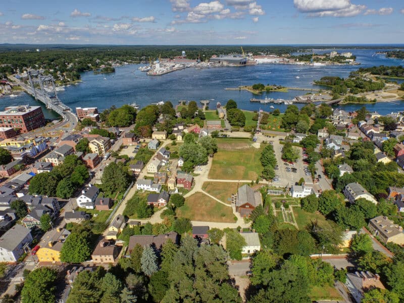 An aerial view of a historic district by the bay.