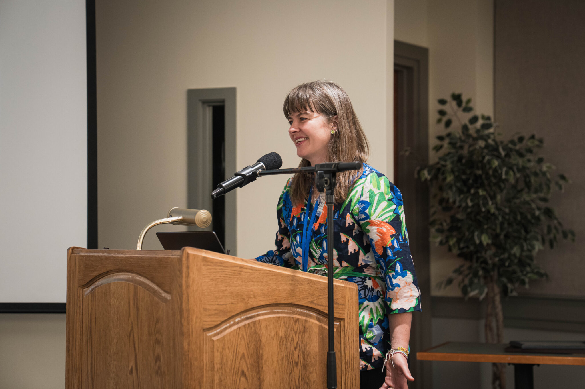 Author Elizabeth Rush presents from a podium